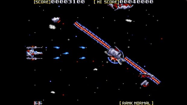 Sol-Feace gameplay: a white and red spacecraft firing long red beams at an enemy ship against a black starfield.