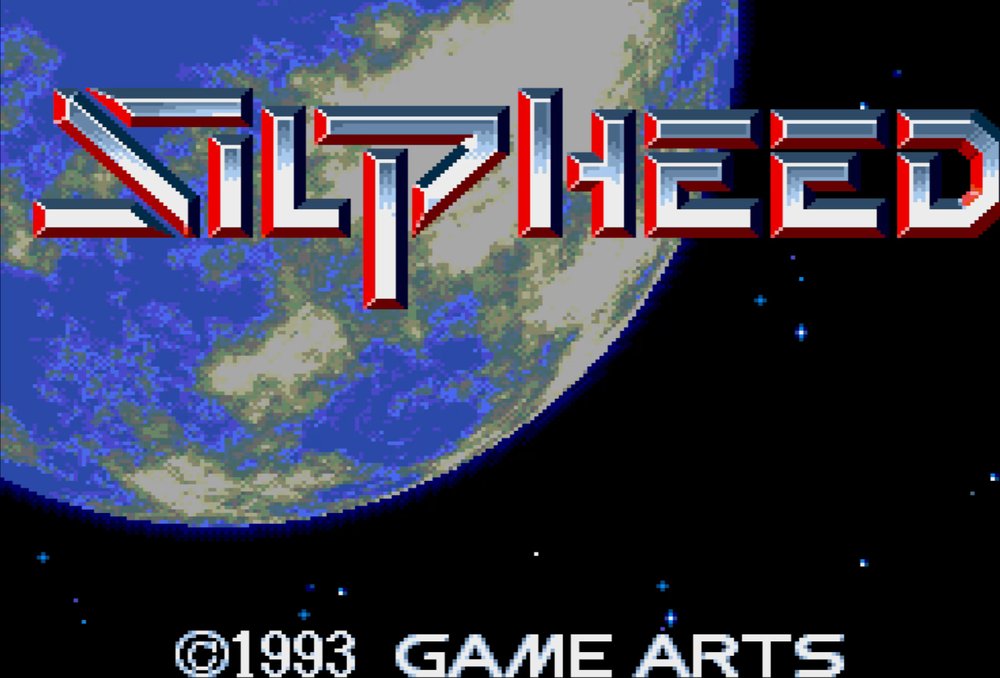 The Silpheed title screen: the chrome red-and-white SILPHEED logo over a blue planet seen from orbit, with the line 1993 GAME ARTS beneath.