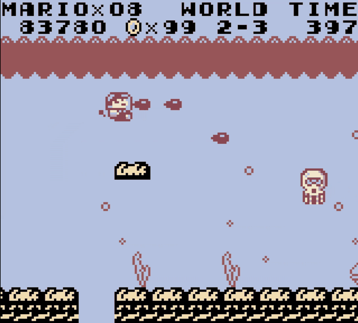 World 2-3 of Super Mario Land: Mario pilots a small submarine firing torpedoes through an underwater level, with an octopus enemy and bubbles on the right and a coral seabed below.